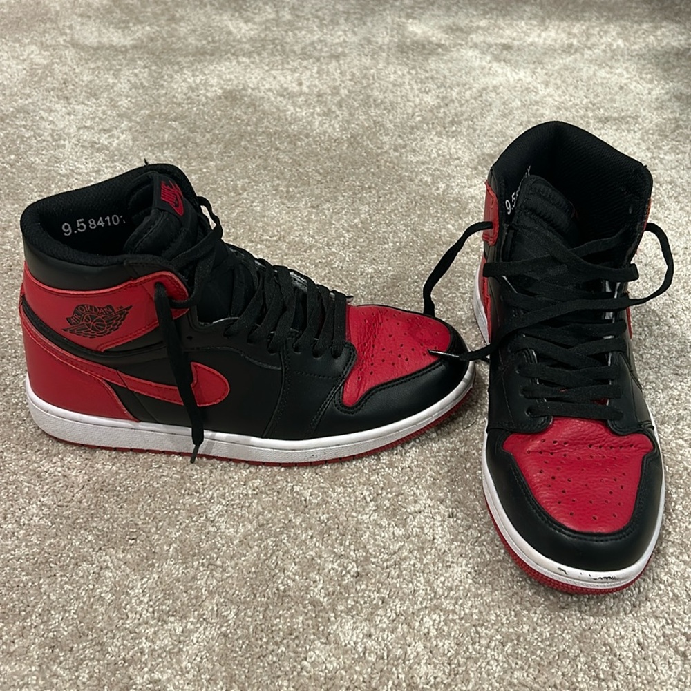 Red and black Air Jordan Nike high tops